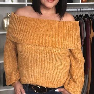 Off the shoulder knit sweater.